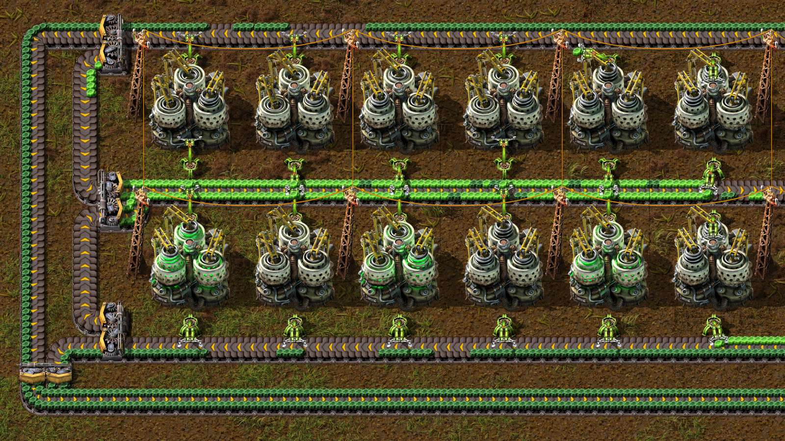 A Factorio factory with defensive walls