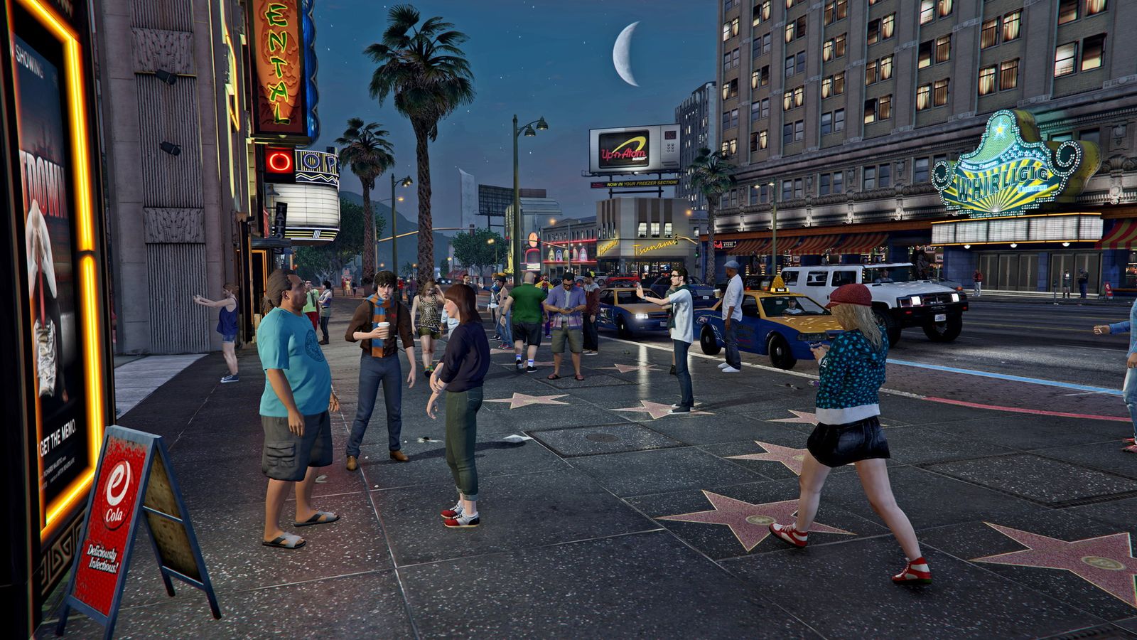 Players driving through Los Santos on a FiveM server