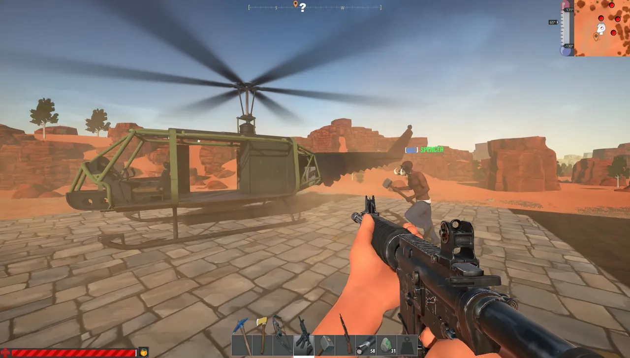 Hurtworld players fighting near a wooden structure