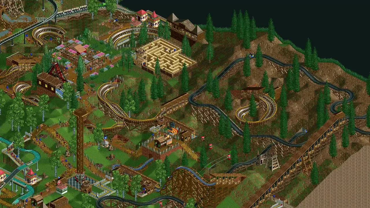 A busy OpenRCT2 park with rides and guests