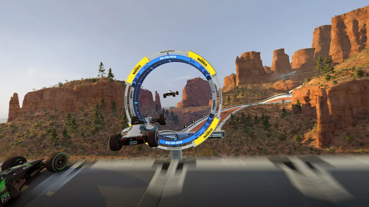 Cars racing through a stadium track in Trackmania