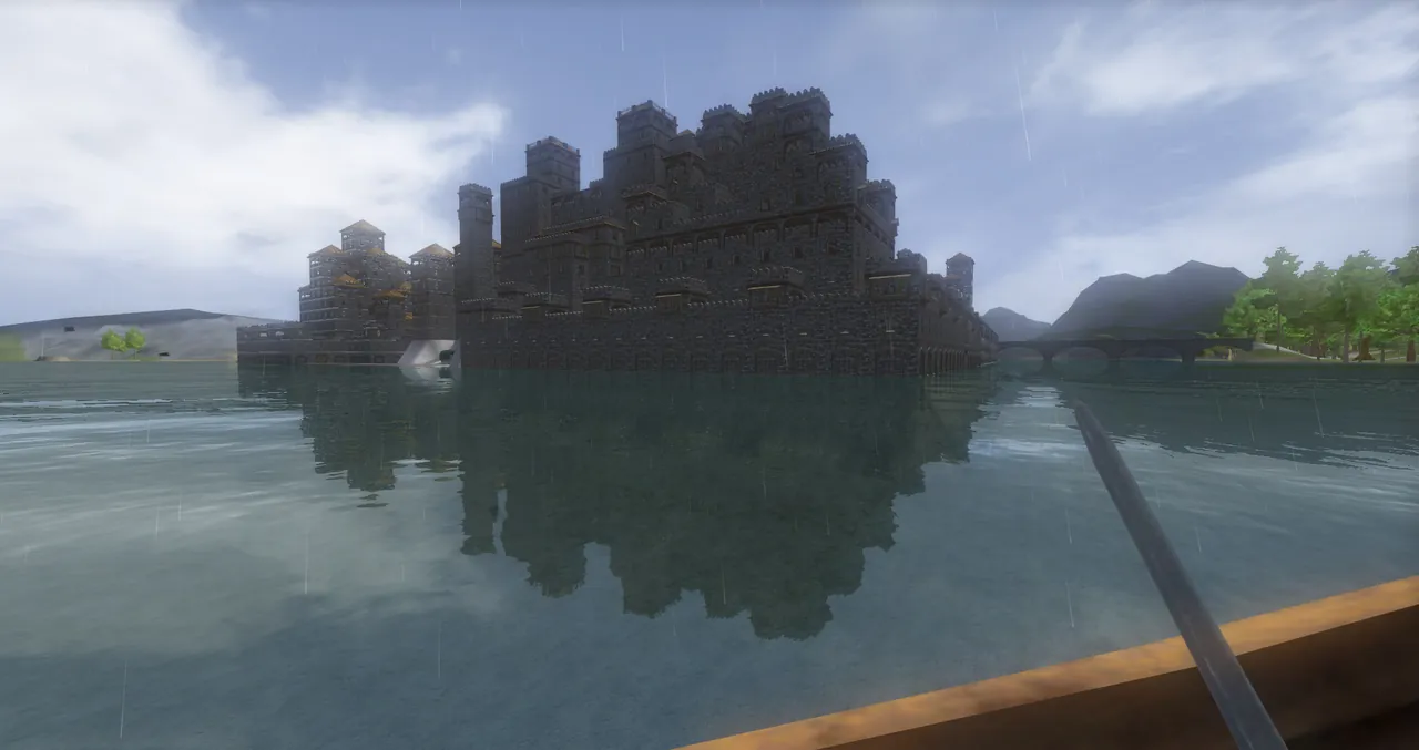 A large stone castle built by players on the water in Wurm Unlimited, seen from a rowing boat